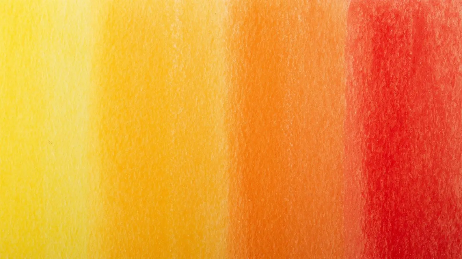 Colored pencil gradient from yellow to orange to red on practice sheet