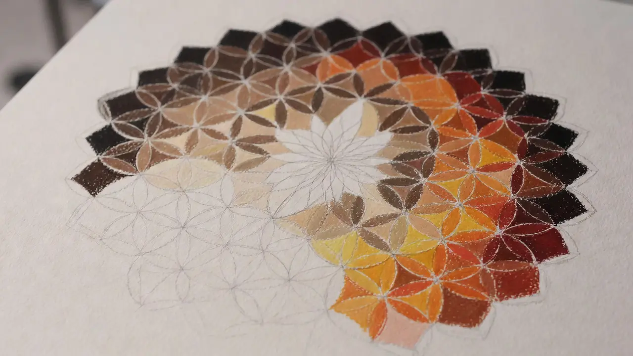 Mandala layering technique showing gradual color buildup from light to dark to create depth and smooth shading in an intricate mandala design