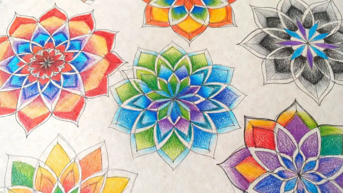 Colorful mandala designs on paper.
